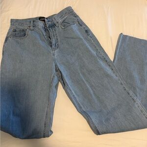 Fashion nova Classic Blue Denim Jeans. Original tags. Great fit. Size 9